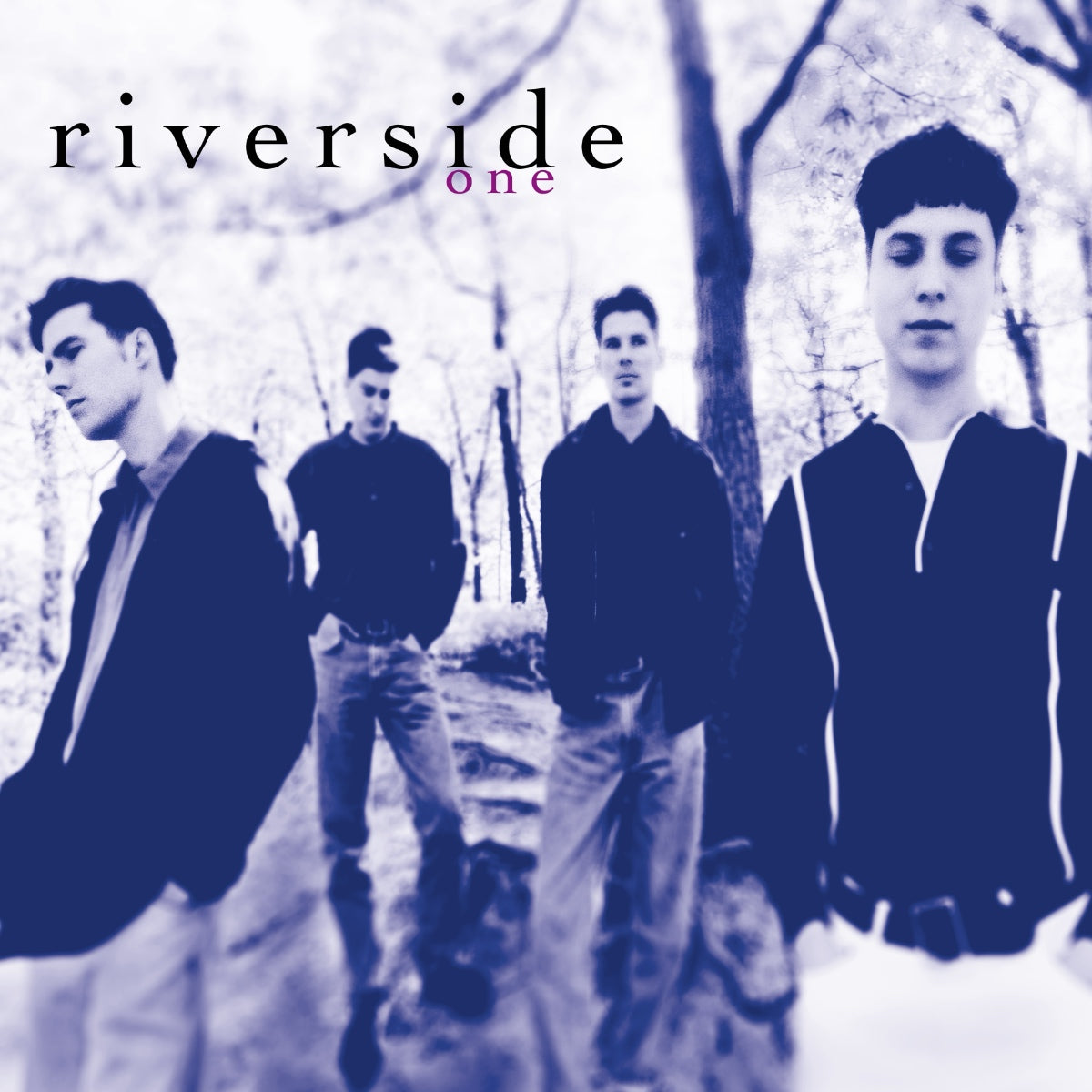Album cover for One by Riverside, showing four men standing in a wooded outdoor setting with a soft blue and white tint.